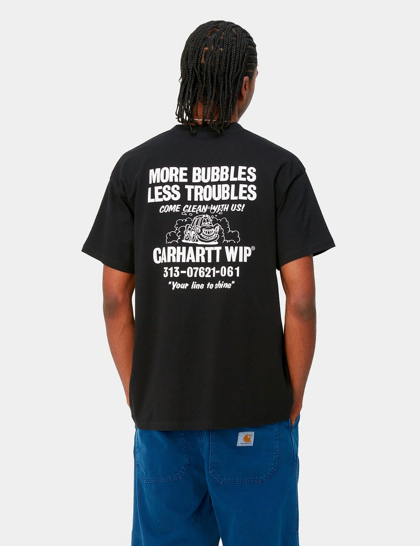 T-Shirt „Less Troubles“ (locker geschnitten) – Schwarz/Weiß